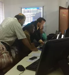 SERVIR Project Scientist Ashutosh Limaye and SPoRT’s Jonathan Case demonstrate WRF model runs for RCMRD/SERVIR-Eastern and Southern Africa’s Allan Maungu, James Wanjohi, and Kenneth Mubea.