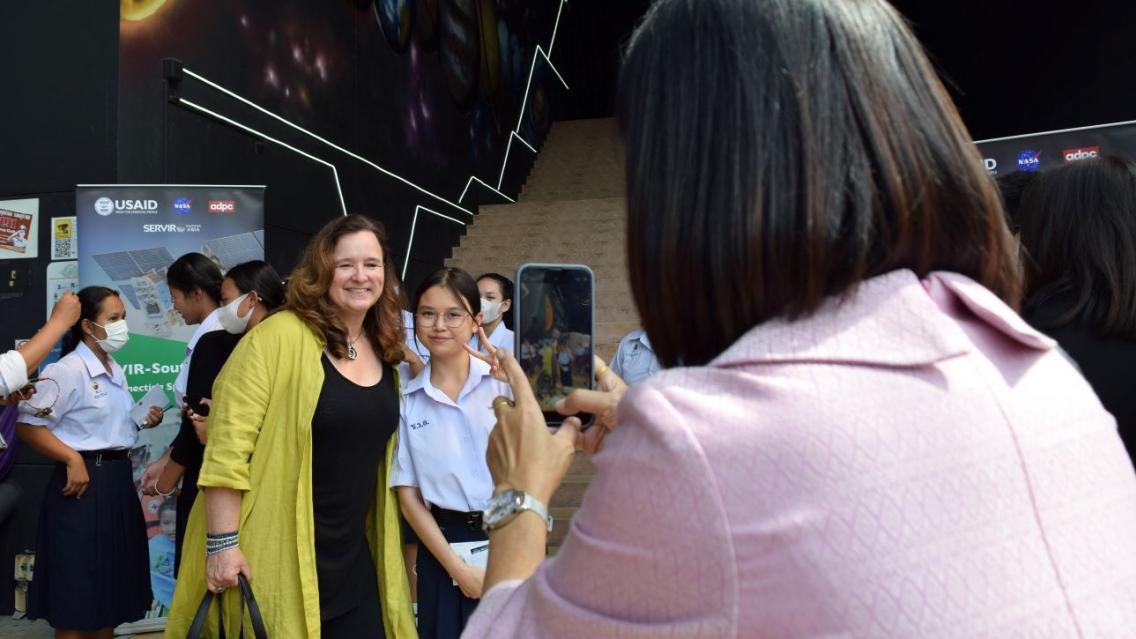 Karen St. Germain with student at Southeast Asia launch event