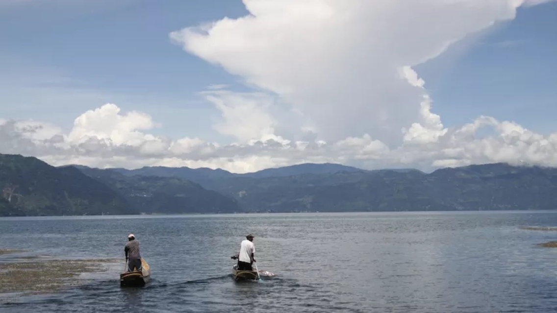two boaters on Lake Atitlan