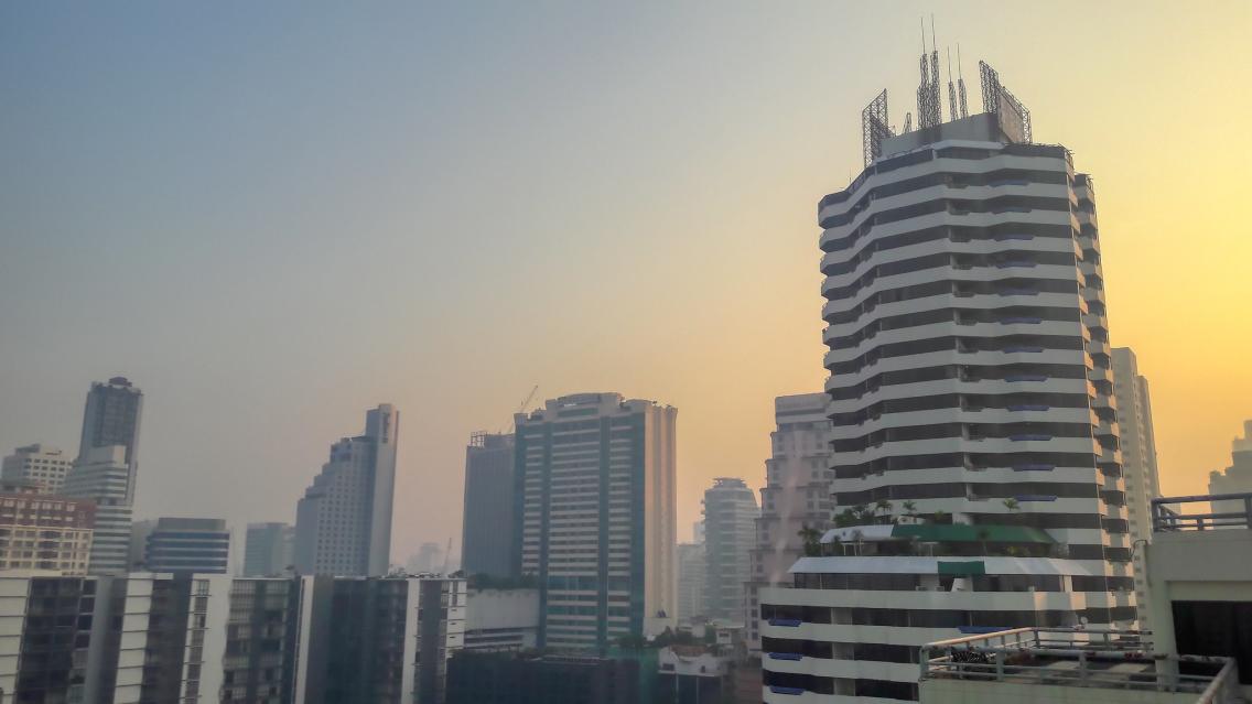 hazy sky city buildings